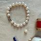 Bracelet en perles naturelles montées sur fil de soie coloré
