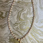 Collier vintage transformé: perles naturelles montées sur fil de soie et fermoirs en or jaune